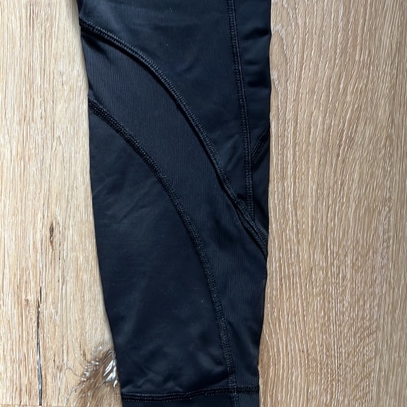 Lululemon size 6 black running leggings with mesh around calf. - Picture 2 of 4